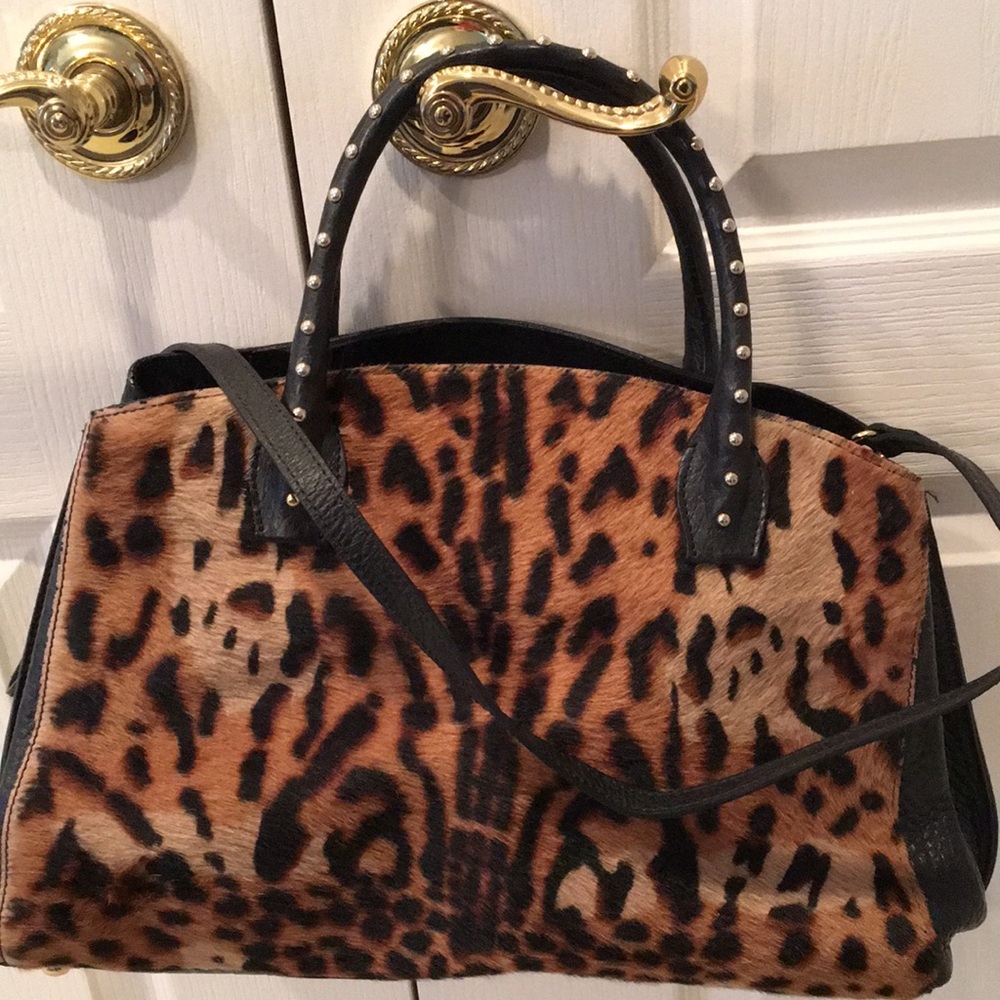 Iacucci studded genuine Leather tote. Animal motif.